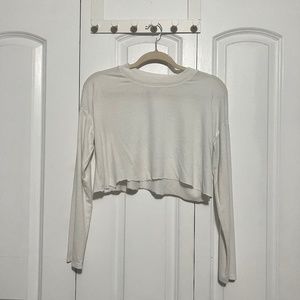 white cropped long sleeve sweater